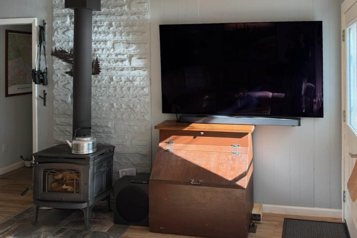 Entertainment corner - woodstove & brand new TV + sound syst