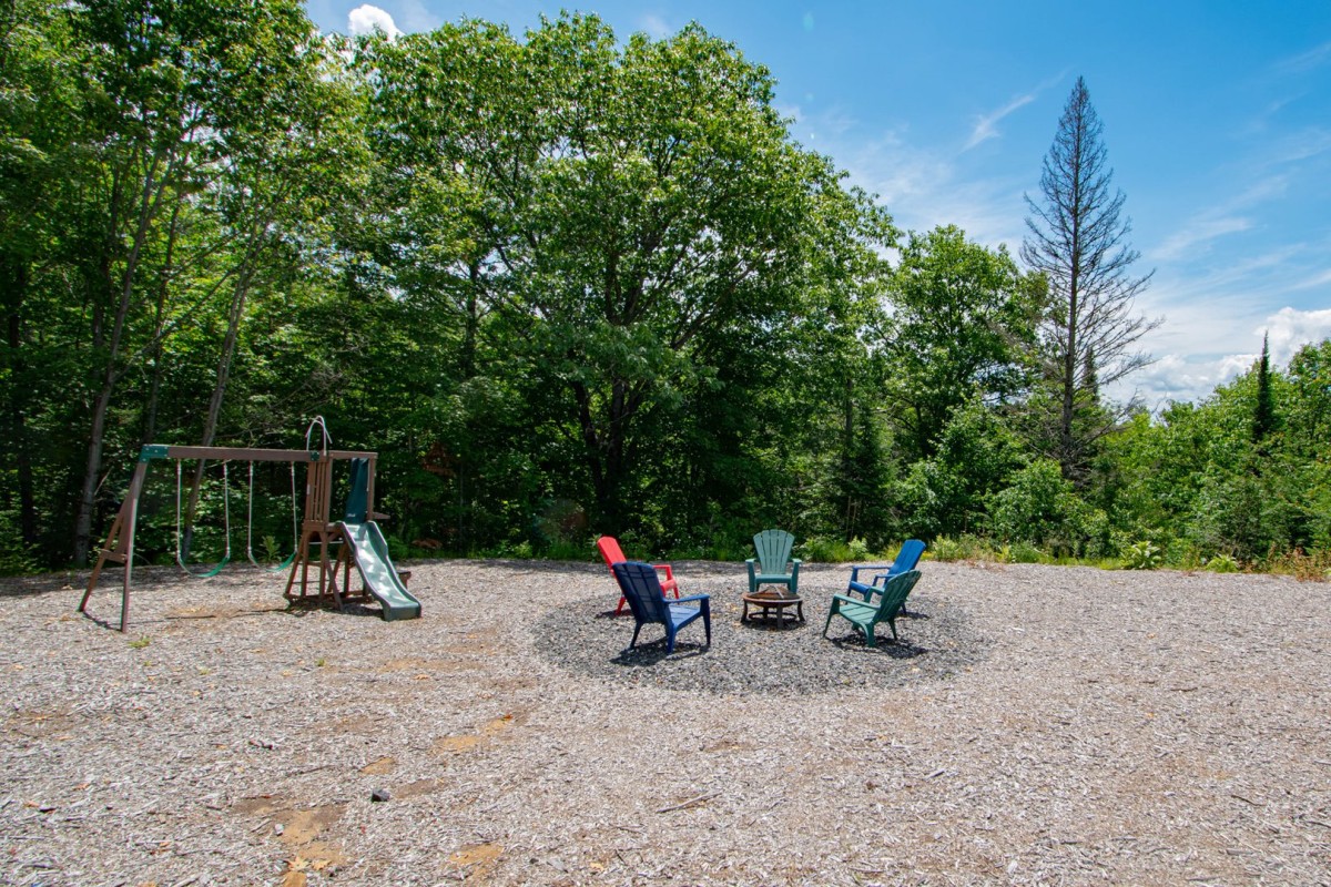 The adults can enjoy a campfire while the kids play