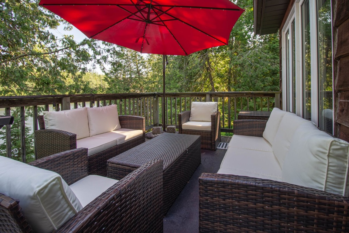 Get Cozy on the Deck overlooking Four Mile Lake