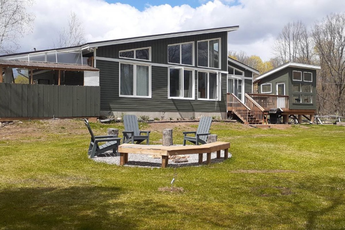 Firepit & waterside of the cottage in early spring