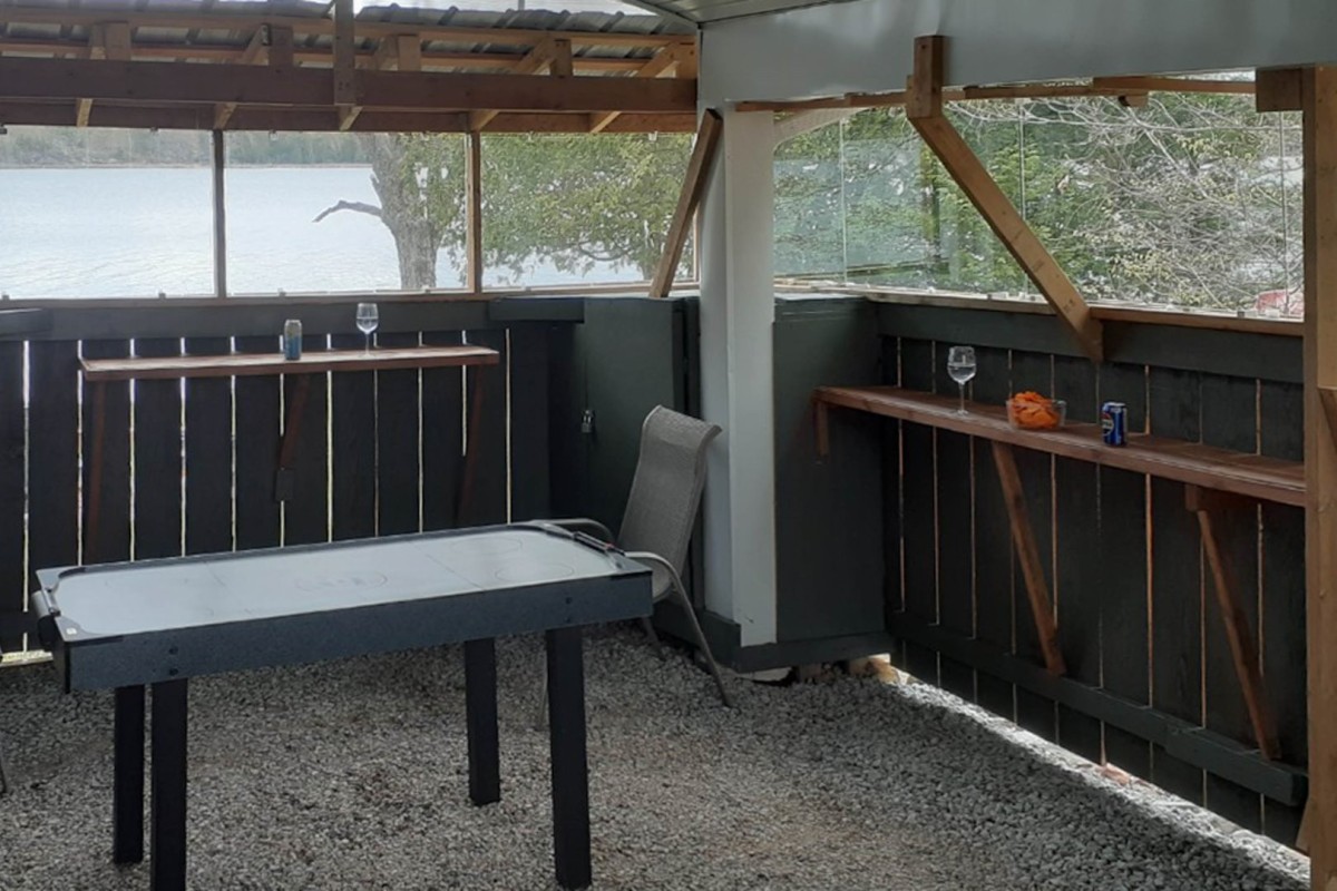 Outdoor, Covered Games Room with Lake Views