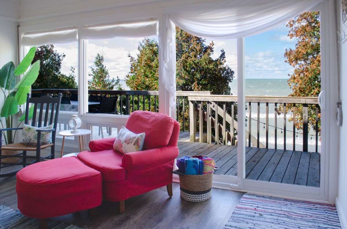 Living room with incredible lake view off the Deck
