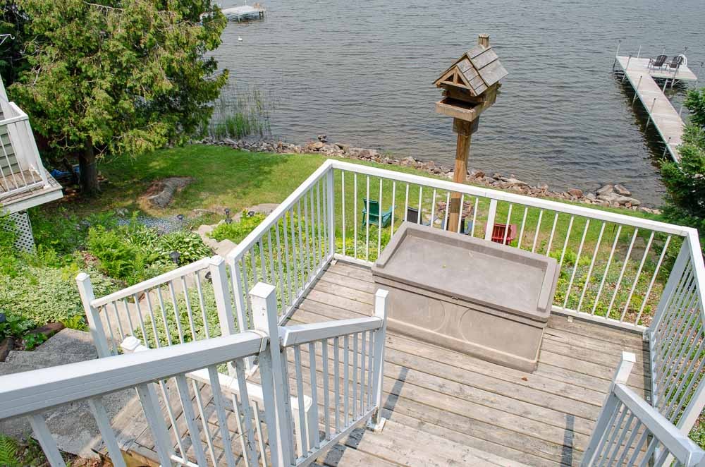 Deck steps leading to the sunroom & waterfront