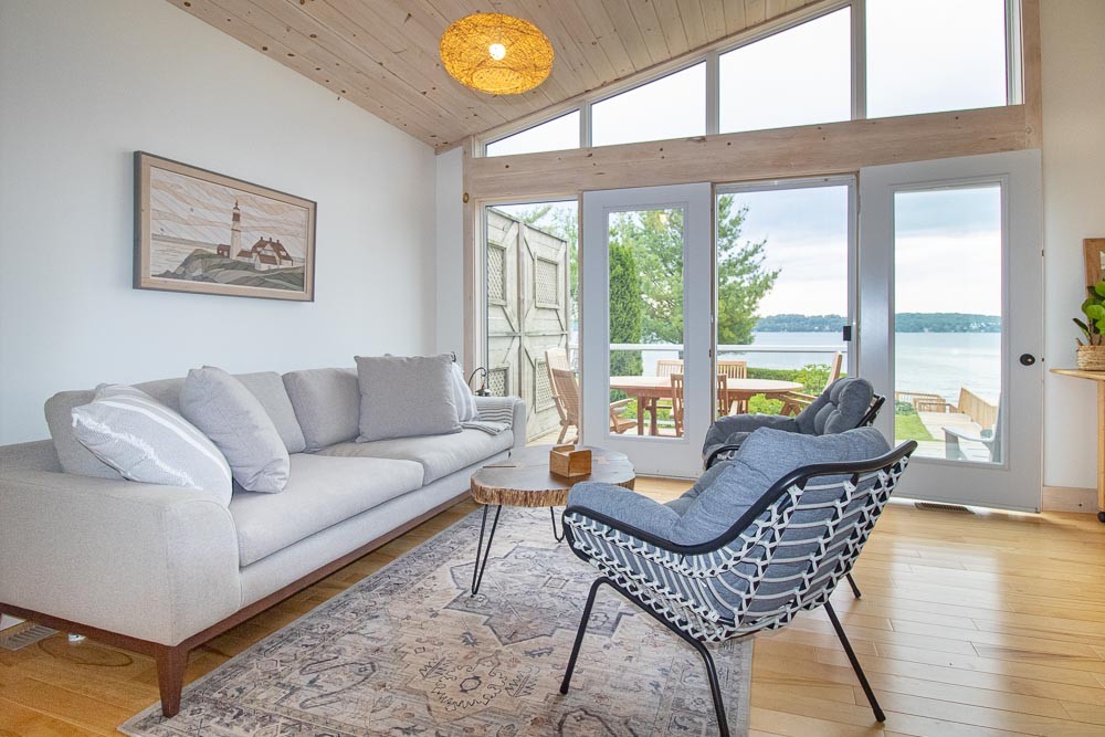 Seating Area in Sunroom with Great Waterfront View
