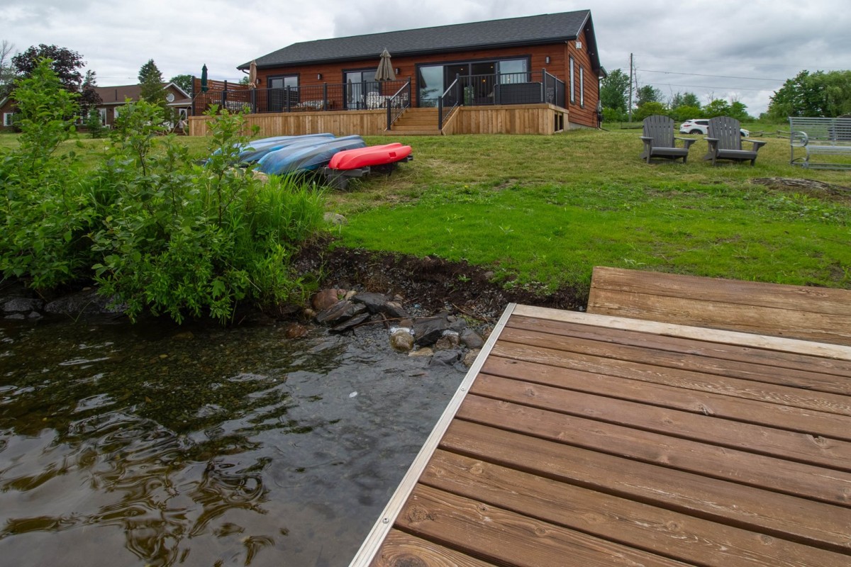 To the right of the dock