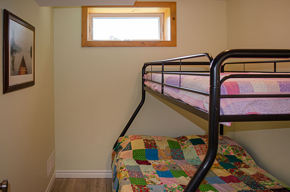 Lower level single over double bunk