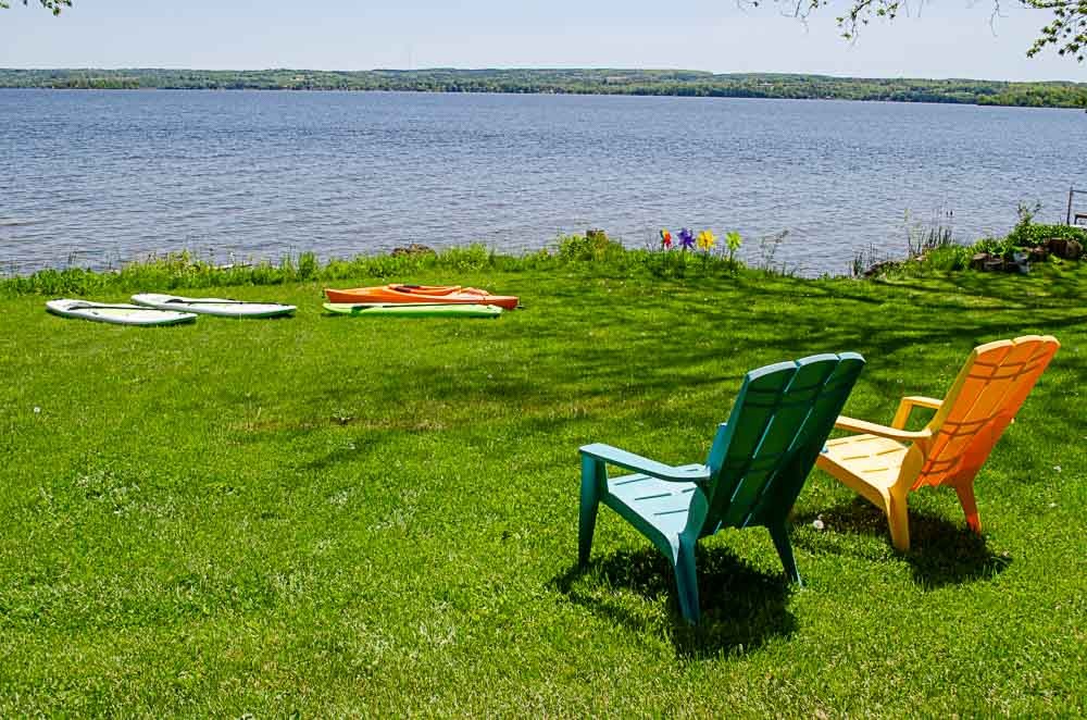 Lakeside seating and watercraft to enjoy