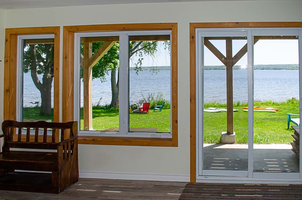 Lower level patio doors and view of Rice Lake