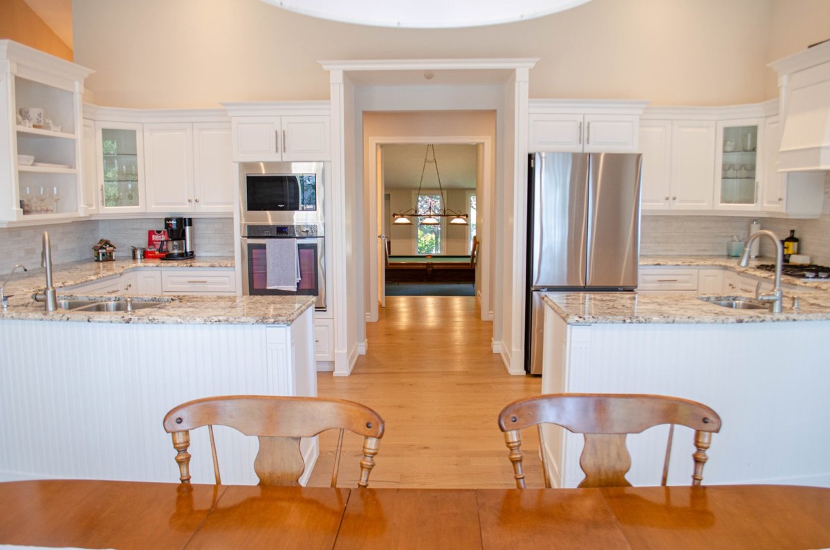 Kitchen with view of walk through to games room