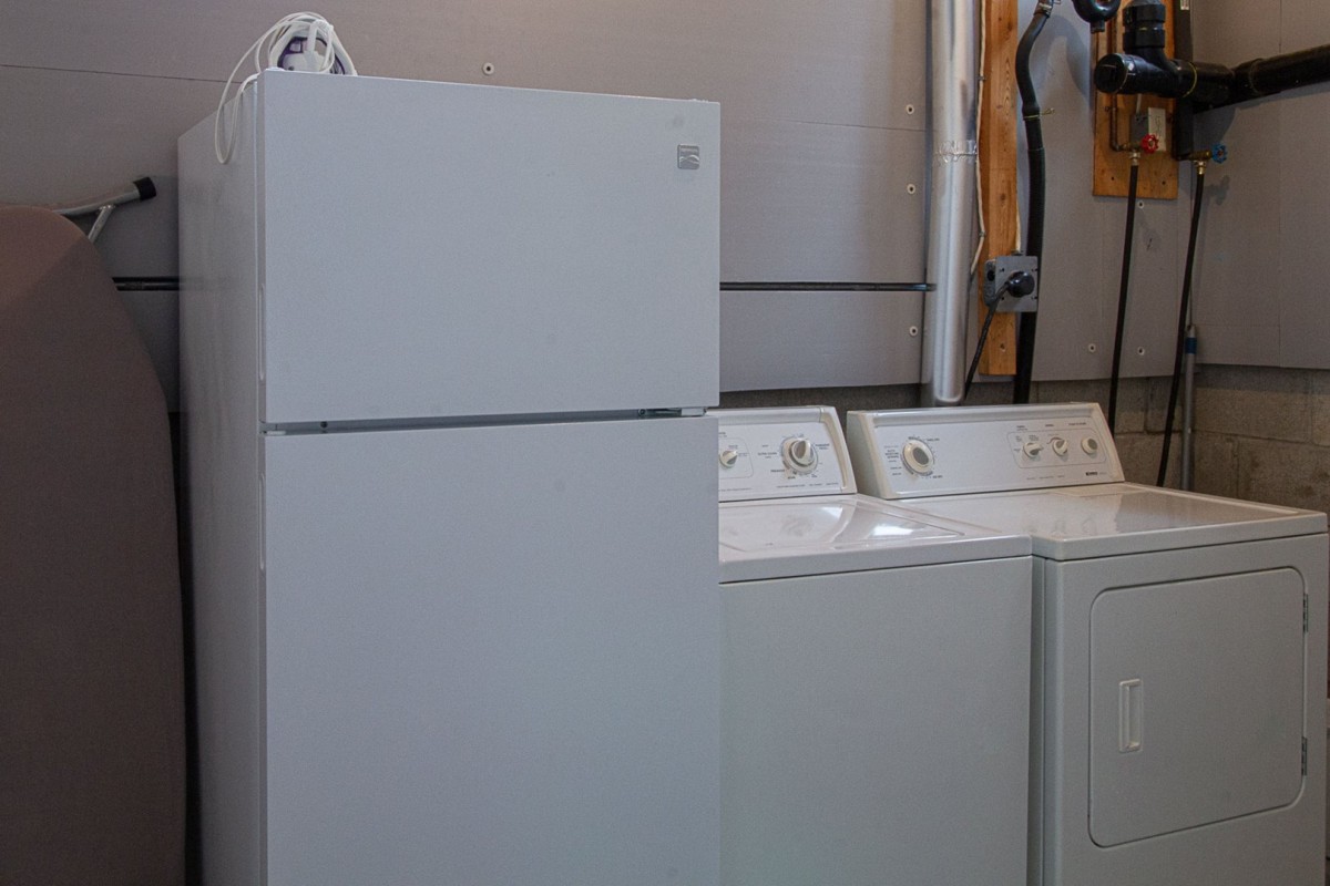 Laundry room with second fridge