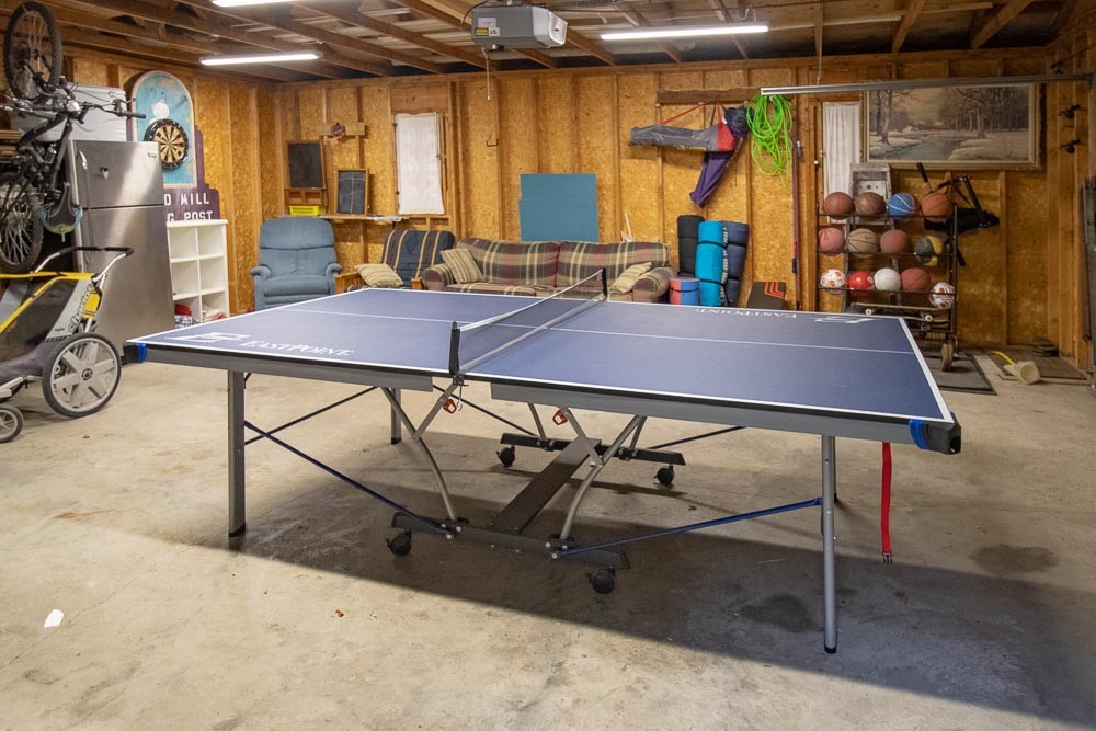 Games Room in Garage with Ping Pong Table and Darts
