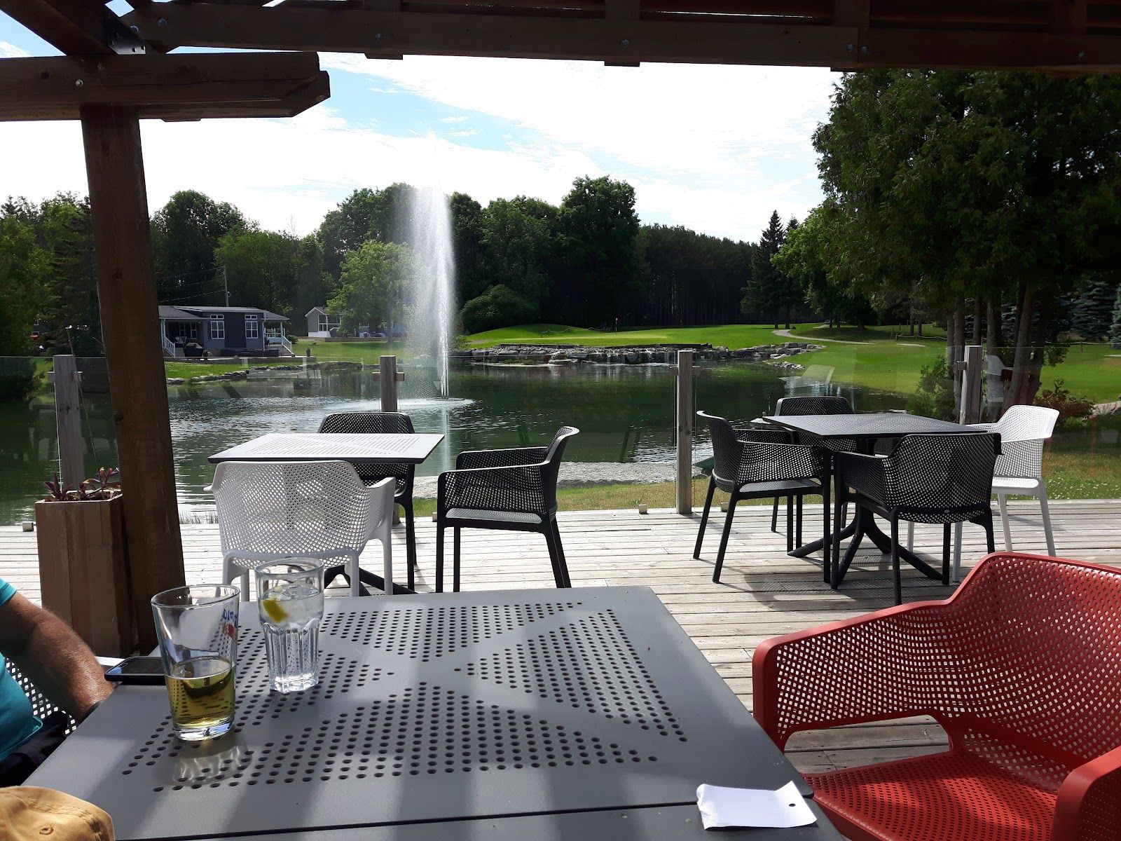 Kawartha Lakes cottage rental - Treetops Restaurant outside deck dining overlooking pond